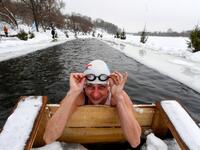 Natalya Seraya, the founder and chief of Moscow's ice swimming club "Walruses of the Capital", poses while swimming in the icy waters of the Moscow River on February 3, 2019. 
Kirill KUDRYAVTSEV / AFP