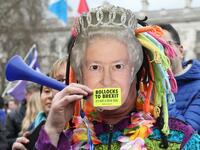 A protester wears a mask of the Queen at a rally organised by the pro-European People's Vote campaign for a second EU referendum in Parliament Square, central London on March 23, 2019.
Isabel INFANTES / AFP