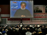 A picture taken on Nov. 10, 2017, shows Hassan Nasrallah, the head of Lebanon's militant Shiite movement Hezbollah, giving a televised address during a gathering in Beirut's southern suburb. 

Nasrallah said Saad Hariri, who resigned as Lebanese prime minister from Riyadh last week, was "detained" by Saudi Arabia.

(ANWAR AMRO / AFP)