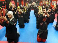 Kuwaiti women practise hybrid martial art Kajukenbo in a club in Kuwait City.
Yasser Al-Zayyat / AFP