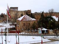 Partial view of the snow-clad Roman ruins in the city of Baalbeck in Lebanon's Bekaa valley. 
STRINGER / AFP