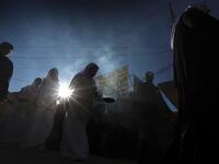 Iraqi Yazidis attend the funeral of the Mir Takhsin-Beg (Tahseen Said Ali), the hereditary leader of the Yazidi community in the world, in the town of Sheikhan, 50km northeast of Mosul.
SAFIN HAMED / AFP