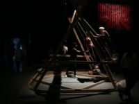 Two people are pushed on the interactive project Network of Swings. Created by 25-year-old Yasmeen Sabri one installation is located at the Amman Design Week, with another at the Zaatari Refugee camp. (Al Bawaba/Salim Essaid) 