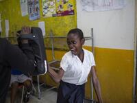 Girls practice self defence methods during a session with NGO Action Breaks Silence (ABS) called "Empowerment through Self-defence for Women and Girls" which aims to create a world free form fear of gender based violence. (GULSHAN KHAN / AFP)