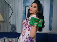 Ahlam posted pictures of herself wearing multiple Jalabiya designs that are available on her online store to 