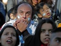 Fans of Argentina watch the FIFA World Cup Russia 2018 match between Argentina and Iceland on a large screen at San Martin square in Buenos Aires on June 16, 2018. 
ALEJANDRO PAGNI / AFP