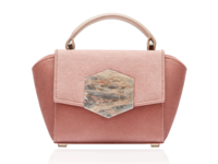 Bakari is a Spanish handbag brand by designer Carmen Lopez with the purpose of protecting handmade production techniques.  Bakari utilizes sustainable materials including upcycled marble and wood from refineries, and upcycled silver.