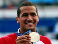 Oussama Mellouli swims to Olympic Gold for Tunisia at Beijing 