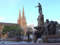 The J. F. Archibald Memorial Fountain, Hyde Park, Sydney, New South Wales. The design of the fountain is a mixture of Greek and Roman influences that features the god Apollo encircled by other mythical beings that spray water to the delight of visitors. 