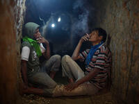 hamas fighters smoking in tunnel