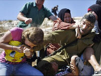 palestinian family attacks masked israeli soldier video