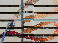 eL Seed graffiti wall Arab artist Sharjah