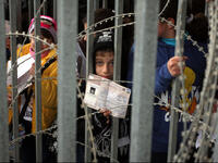 palestinian children barbed wire checkpoint