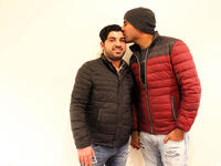 Betu Allami and Nayyef Hrebid met during the 2004 siege of Ramadi. Hrebid was a translator for the US, and Allami was an Iraqi soldier. "I saw him," says Hrebid, 'and I was like...he is perfect.' Now married, and living in Seattle, hear their story of escape from Iraq where being gay could mean jail or worse, on KUOW radio. (Image from kuow.org)
