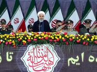Iranian President Hassan Rouhani delivers a speech during the annual military parade marking the anniversary of the outbreak of the devastating 1980-1988 war with Saddam Hussein's Iraq, in the capital Tehran on September 22, 2018. (STRINGER / AFP) 