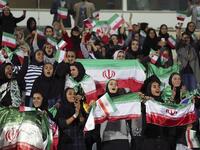 Iranian women cheer during the friendly football match between Iran and Bolivia at the Azadi Stadium in Tehran on October 16, 2018. (STR / AFP)
