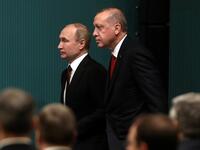 Russian President Vladimir Putin (L) and Turkish President Recep Tayyip Erdogan (R) arrive for a joint press conference on April 3, 2018.  Putin launched the construction of Turkey's first nuclear power station and quicken the delivery of air defence systems to Ankara that has alarmed NATO. (ADEM ALTAN / AFP)