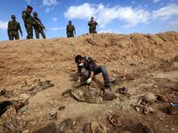 The United Nations in Iraq (UNAMI) and its human rights office said they had documented a total of 202 mass graves in parts of western and northern Iraq held by IS between 2014 and 2017.(Safin HAMED / AFP)