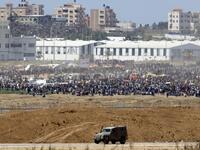 Tens of thousands protested and clashes erupted along the Gaza border against the US transfer of its embassy to Jerusalem, after months of global outcry, Palestinian anger and exuberant praise from Israelis over President Donald Trump's decision tossing aside decades of precedent. JACK GUEZ / AFP
