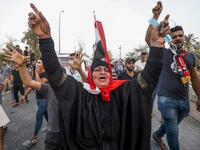 Iraqi protesters gesture and chant slogans as they gather in a demonstration against corruption and lack of basic services outside the local government headquarters in the southern city of Basra on September 2, 2018. 
Haidar MOHAMMED ALI / AFP