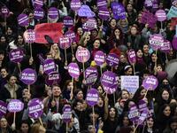 Women's rights activists gather to march through Taksim Square to protest against gender violence in Istanbul, on November 25, 2018, on the International Day for the Elimination of Violence against Women. 
Yasin AKGUL / AFP