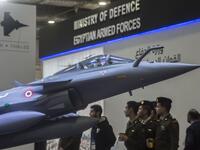 A model of the French made Rafale jet fighter is displayed during Egypt’s first Service Defence Exhibition in Cairo on December 3, 2018, at the International Exhibition Center. 
Khaled DESOUKI / AFP