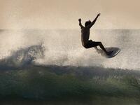 A surfer enjoys the waves at Las Baulas National Marine Park, Playa Grande, Costa Rica on December 10, 2018. David GANNON / AFP