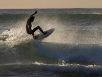 A surfer enjoys the waves at Las Baulas National Marine Park, Playa Grande, Costa Rica on December 10, 2018. David GANNON / AFP