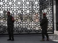 Palestinian security forces loyal to Hamas stand at the Rafah crossing point between Egypt and the southern Gaza Strip on January 24, 2019 in Rafah. 
SAID KHATIB / AFP