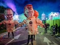 Statues depicting US President Donald Trump and Russia's Vladimir Putin as evil clowns parade on the first day of the 135th Nice Carnival which runs until March 2 under the theme "King of Cinema," on February 16, 2019 in Nice.
VALERY HACHE / AFP