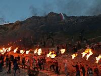 Iraqi Kurds holding lit torches walk up a mountain in the town of Akra, 500 kilometres north of Baghdad, on March 20, 2019 during celebrations of Nowruz (Noruz), the Persian New Year.
SAFIN HAMED / AFP