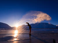 Frost effect hot water freezes man pours boiling water. (Shutterstock/ File Photo)