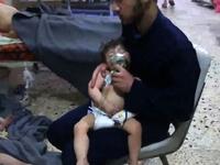 An image grab from a video released by the Syrian Civil Defense shows hospital volunteers giving aid to children after an alleged chemical attack in Douma on Saturday (AFP)