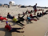 Young Palestinian members of a swimming club. (SAID KHATIB / AFP)