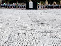 The largest Keffiyeh with a size of one thousand four hundred Meter square in dura. (HAZEM BADER / AFP)