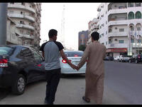 arabs holding hands