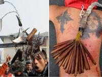 Some Shia men emulate the suffering of Hussein by flagellating themselves with chains or cutting their foreheads with
their palms until blood streams. This can turn quite extreme & frenzied as can get competitive 
& riled up. Not so dissimilar to some devoted Christians at Easter, who self-inflict physical suffering in remembrance of Jesus.