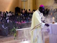 Sudan's First Vice President and south Sudan leader Salva Kiir (seated L) attends the Christmas service at the Juba Catholic Cathedral, in the southern Sudan's capital city, in what may be their last Christmas in a unified Sudan.
