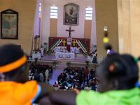 South Sudanese attend a Christmas service at the Juba Catholic cathedral, in the southern Sudan's capital city, in what may be their last Christmas in a unified Sudan. 
