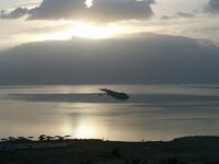 The Dead Sea draws visitors to float weightlessly in the salty water, and to cover themselves in its natural mud packs. Still warm enough to enter the water for much of the winter, tourists will find that the biggest attraction, after fifteen minutes in the sea itself, is enjoying a top class hotel and heated swimming pools.