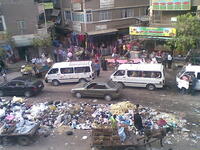 Dirty Egypt: Egypt today is crowded with very high population densities. Cairo, specifically,
is renowned for its pollution & grime, in stark contrast to the Egypt of the pre-Coup era with its roominess, clean feel
 & liberal character. The notoriously decrepit taxi cabs replace the fancy cars.