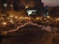 Tear gas fired by Egyptian police is seen during a protest in central Cairo in which demonstrators demanded the ouster of President Hosni Mubarak.