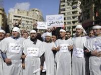 This is my shroud for Egypt: We are here til the finish, and will rise and fall with Egypt.