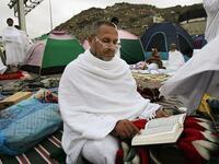 A man who has completed the Hajj is called a Hajji, and a woman, a Hajjah. It becomes a title for life, the spiritual kin if you like to the academic PhD, and said to endow more much wisdom. Once back home, people
 pay their respects and congratulate the honorable Hajjis. During such visits they drink ZamZam water, eat dates, hold prayer
 beads.