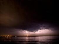 Lebanon, Beirut : Thunder strikes off the shores of Beirut as rain approaches after several months of drought.