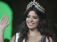 Yara Khoury Mikael waves after winning the Miss Lebanon 2011 beauty contest.