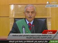 Ahmed Refaat, presiding judge over the court hearing of government officials, including the former Egyptian president and his two sons, opens the first day court session. This judge needs to have presence and to hold court with some authority given the chaos of so many voices vying for attention. 