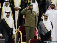 Emir Sheikh Hamad bin Khalifa al-Thani (R) standing next to his son Sheikh Tamim bin Hamad al-Thani (L) before the Emir Cup final match between Al-Sadd and Al-Rayyan at Khalifa stadium in Doha (AFP)