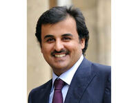 Sheikh Tamim Bin Hamad al-Thani arriving at the Elysee Palace for a lunch with French President Nicolas Sarkozy (AFP)