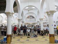 Tunisia: Here performing the evening prayer 'Tarawih' for Ramadan.  Liberated of their unpopular leader, Bin Ali, these Muslims
can give thanks & blessings for Ramadan, 2011. But around them the turmoil and political unrest in the region, 
as well as violence, has not quietened down for Ramadan.